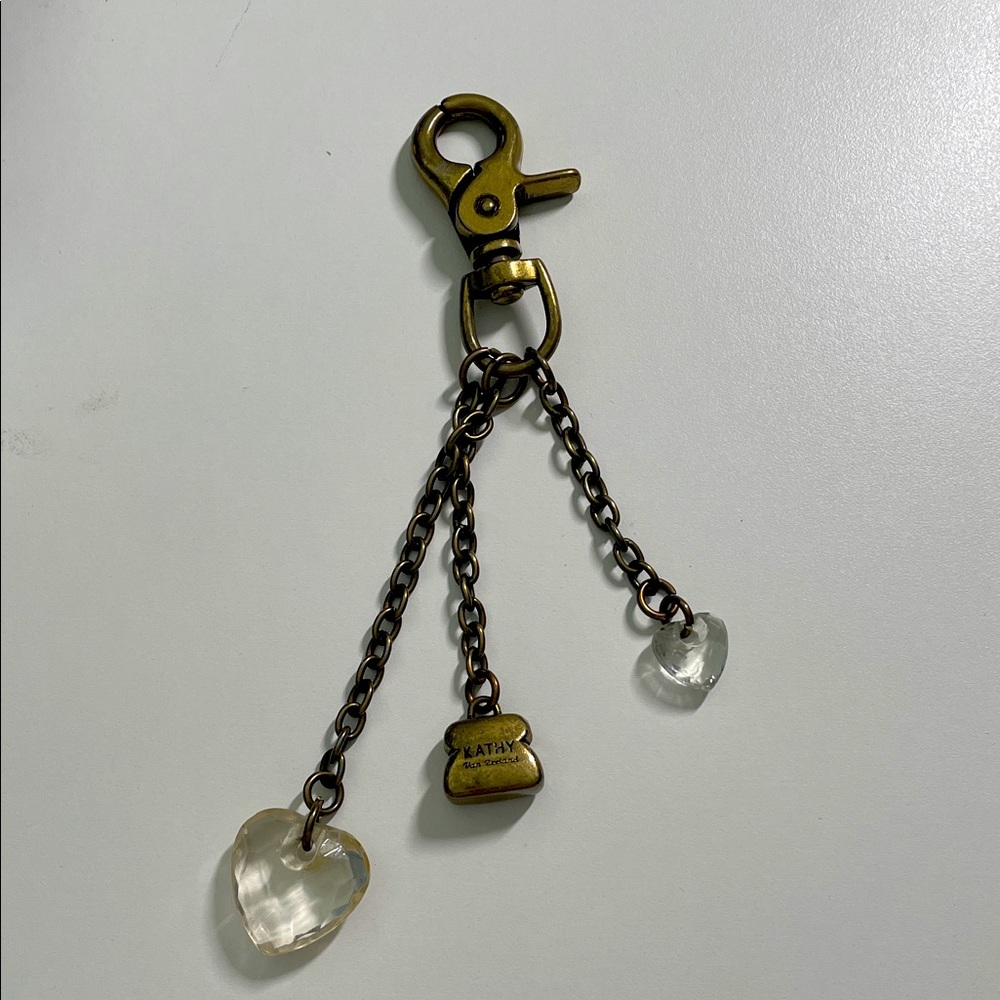 Elegant Gold-Tone bag charm with Heart and Crystal Charms